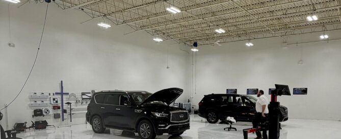 Technician performing ADAS calibration on a vehicle at Calibration Connection in Northeast Ohio