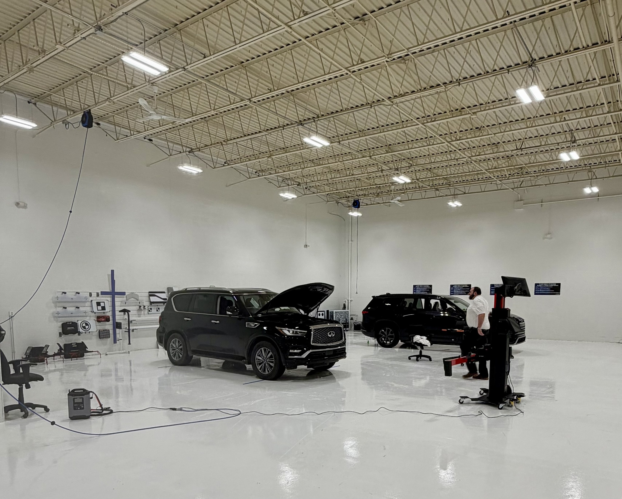 Technician performing ADAS calibration on a vehicle at Calibration Connection in Northeast Ohio